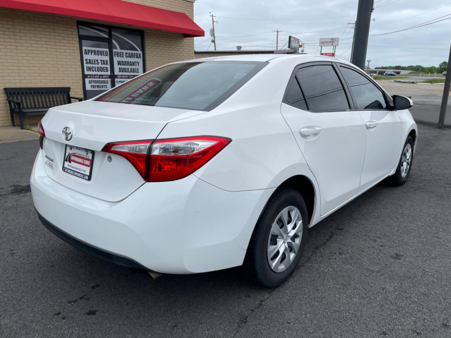 2016 White Toyota Corolla (5YFBURHE8GP) with an 4-Cyl, 1.8 Liter engine, Automatic, CVTi-S transmission, located at 8008 Warden Rd, Sherwood, AR, 72120, (501) 801-6100, 34.830078, -92.186684 - Photo#7